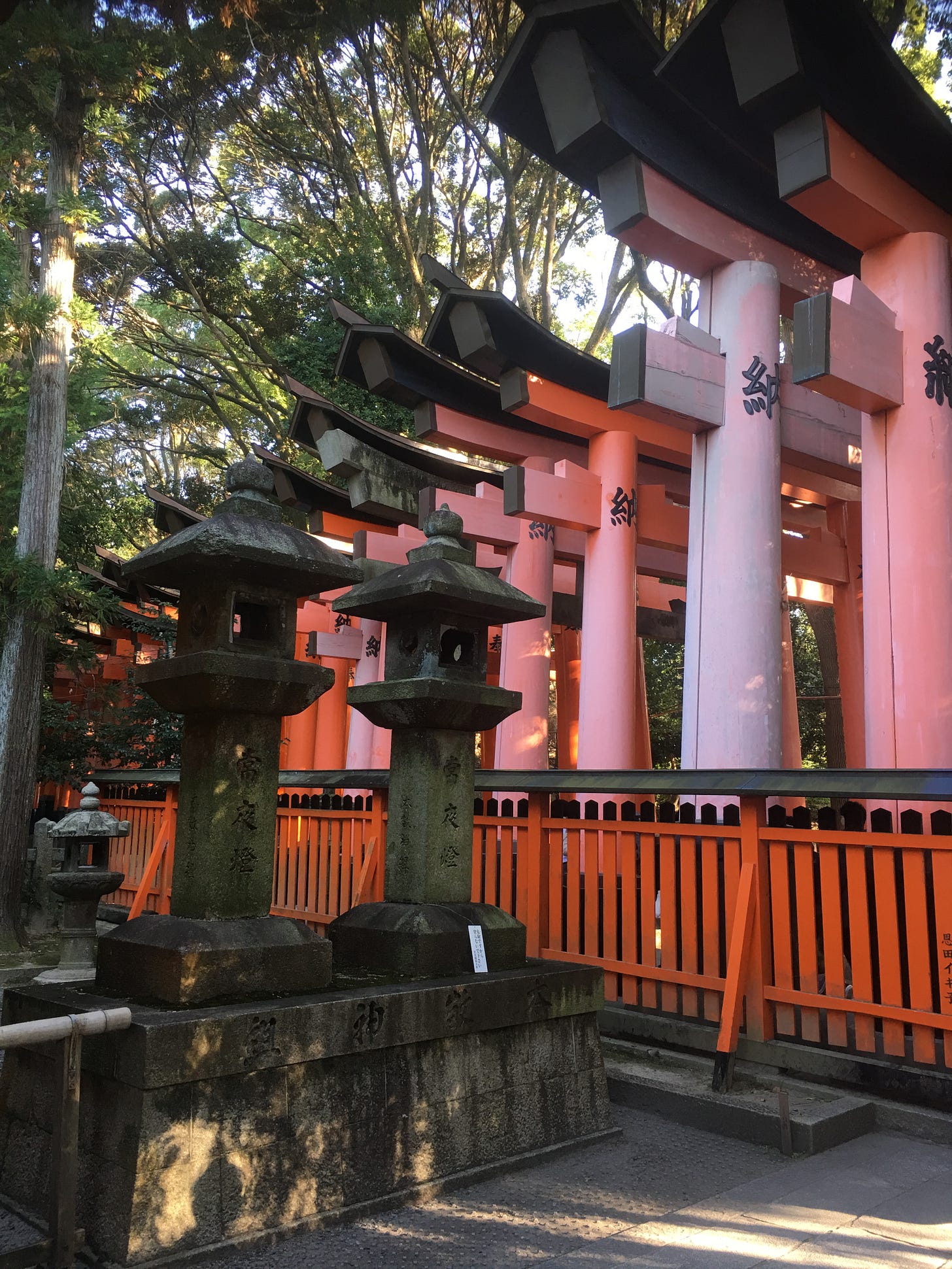 Fushimi Inari shrine, early gates.  (Note that these are not the lanterns that will be important later.  They're just really cool lanterns.)