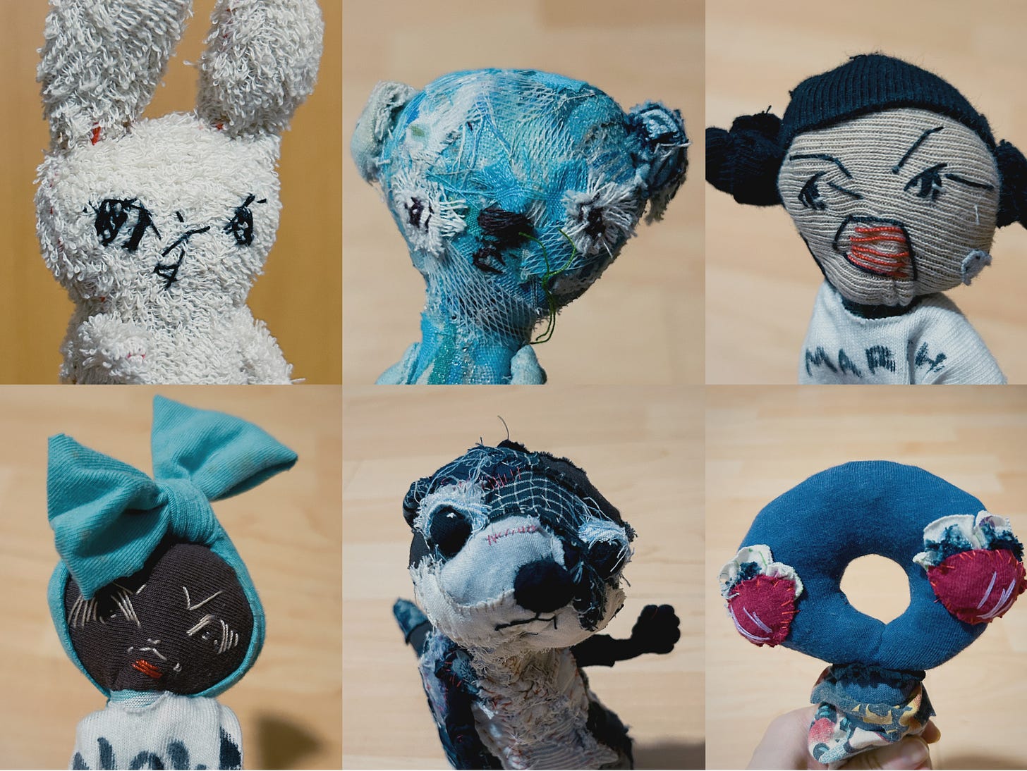 Noisybeak soft sculptures of a rabbit a bear, an otter, outer space creature, and 2 humans.