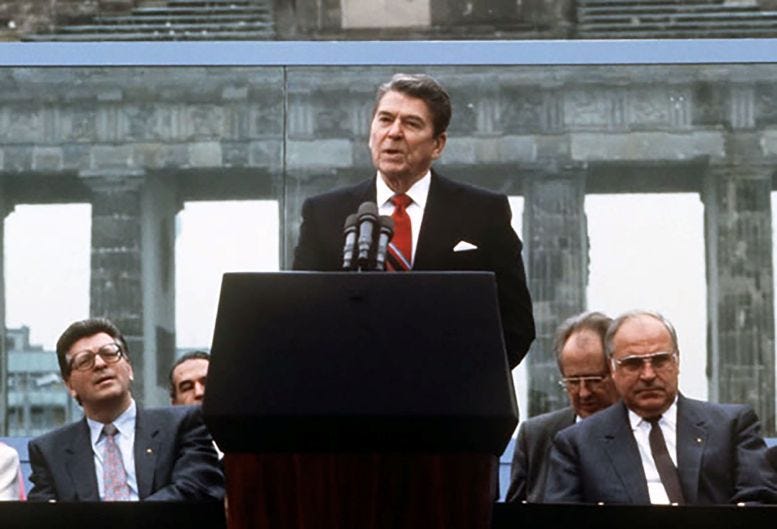 Figure 4: President Ronald Reagan delivering his Tear Down That Wall speech in front of the Berlin Wall on June 12, 1987. Figure 4: President Ronald Reagan delivering his Tear Down That Wall speech in front of the Berlin Wall on June 12, 1987.