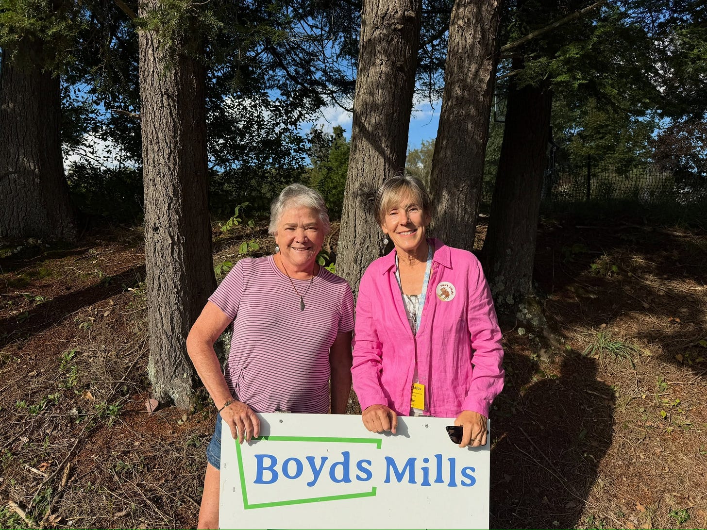 Pattison and Helakoski in front of Boyds Mills sign Pattison and Helakoski in front of Boyds Mills sign