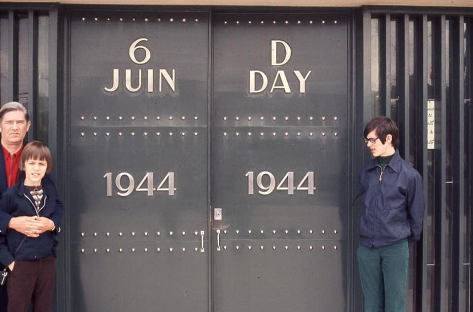 A group of men standing in front of a door
AI-generated content may be incorrect. A group of men standing in front of a door
AI-generated content may be incorrect.