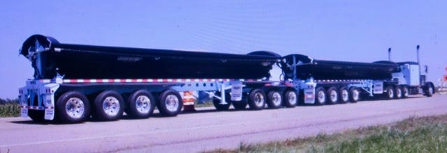 A large truck similar to the ones that would be included in the proposed transportation corridor