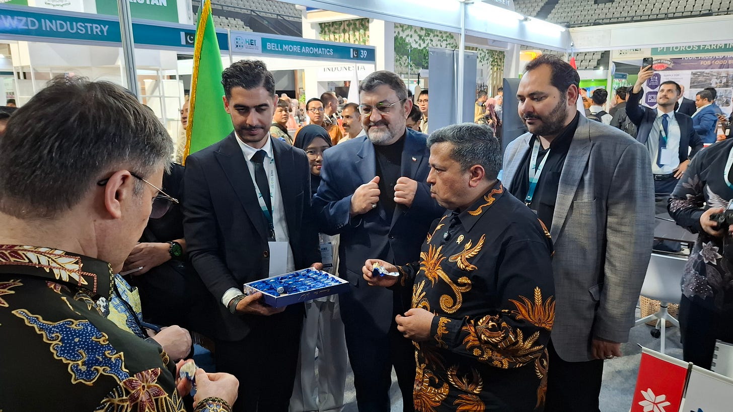 Iran's Ambassador to Indonesia Mohammad Boroujerdi introduce Iranian chocolate to BPJPH Head Ahmad Haikal Hassan Iran's Ambassador to Indonesia Mohammad Boroujerdi introduce Iranian chocolate to BPJPH Head Ahmad Haikal Hassan