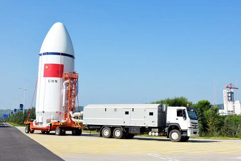 The first-stage and fairing of the Long March 6A heading to Launch Complex 9A.