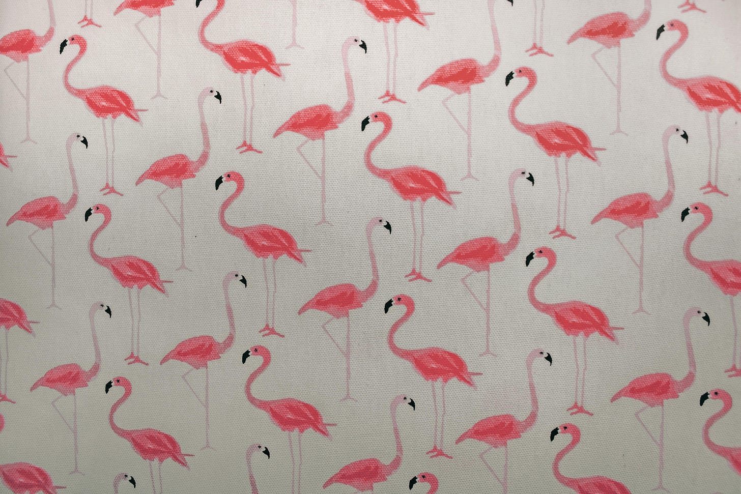 A repeating pattern of flamingos. Why flamingos? Well, why not.