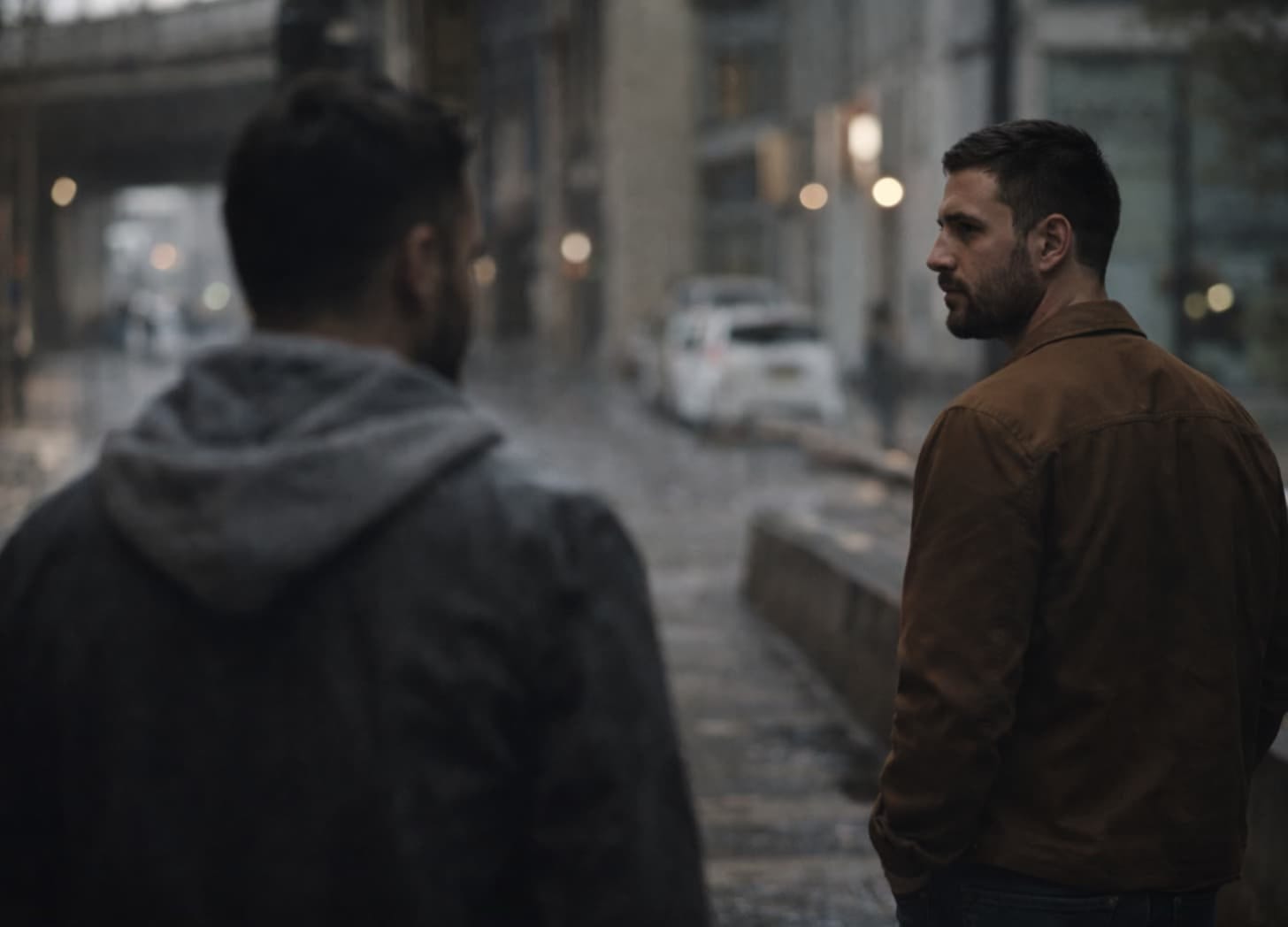 men in the same space, emotionally not together.