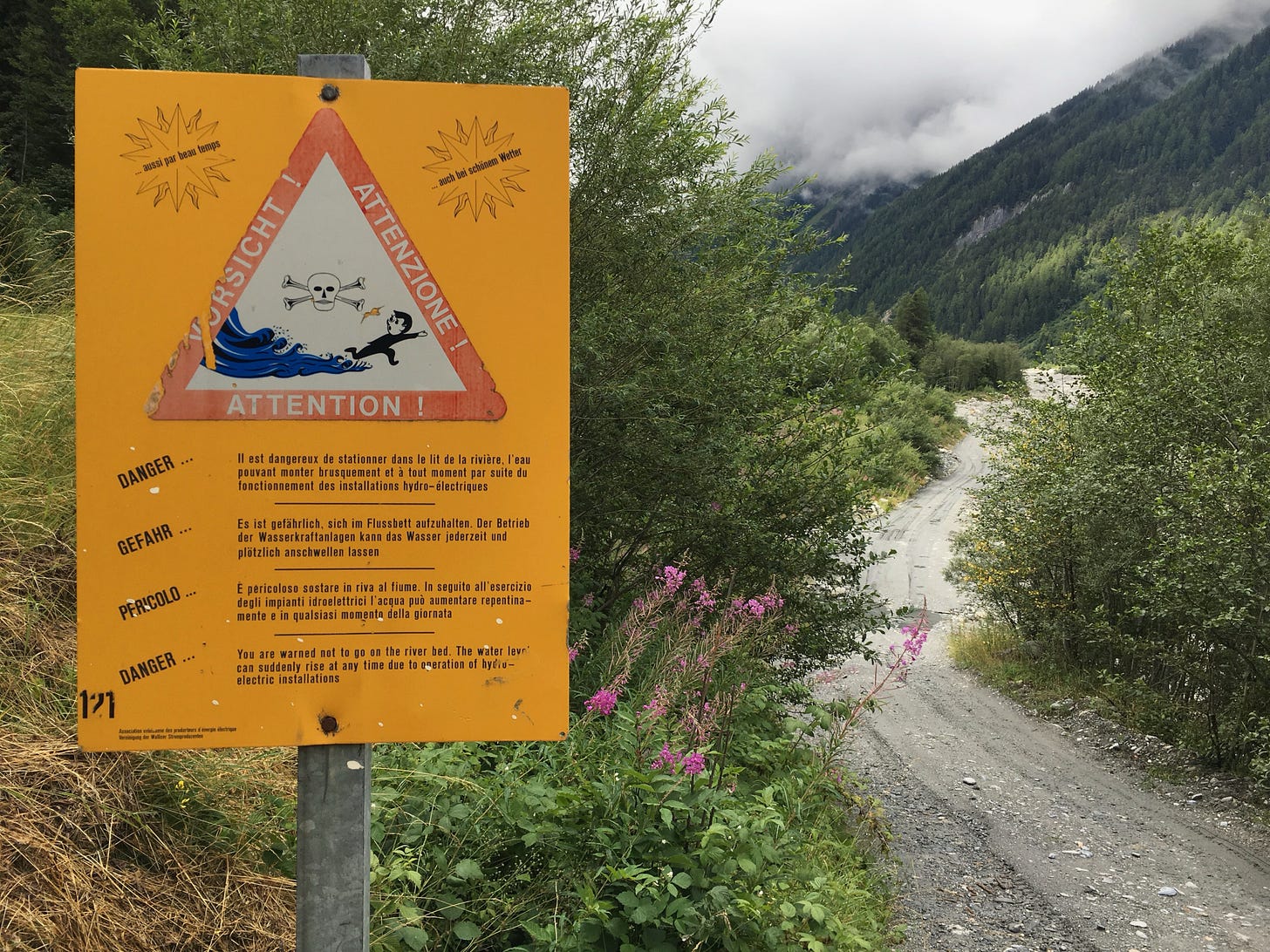 We discovered the hydroelectric plant’s warning sign after we’d bushwhacked into its empty riverbed – oops.