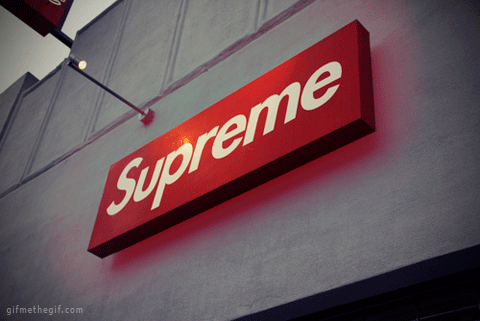 Animated Supreme store sign glowing in red