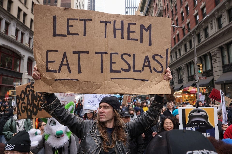 47 signs from the anti-Trump Hands Off! protests - April 6, 2025 | Reuters