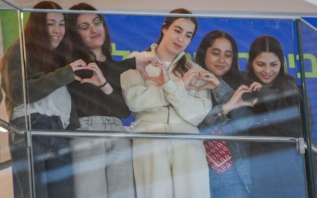 (L-R) Naama Levy, Karina Ariev, Agam Berger, Liri Albag and Daniella Gilboa watch a concert in their honor at Beilinson Hospital in Petah Tikva, February 4, 2025 (Avshalom Sassoni/Flash90) (L-R) Naama Levy, Karina Ariev, Agam Berger, Liri Albag and Daniella Gilboa watch a concert in their honor at Beilinson Hospital in Petah Tikva, February 4, 2025 (Avshalom Sassoni/Flash90)
