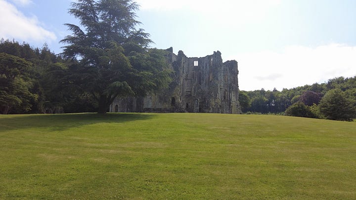 Four photos: Old Wardour Castle photographed from different angles. Images: Roland's Travels