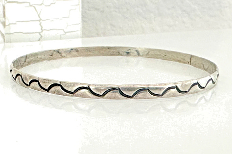 https://www.rubylane.com/item/2013583-ABG192/Taxco-Sterling-Floral-Motif-Link-Bracelet
