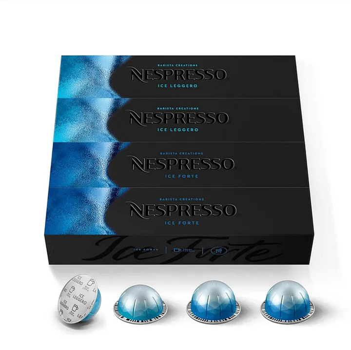 A box of Mezcla protein bars, LMNT electrolyte packets, a bag of Skinny Dipped chocolate almonds, Nespresso pods.