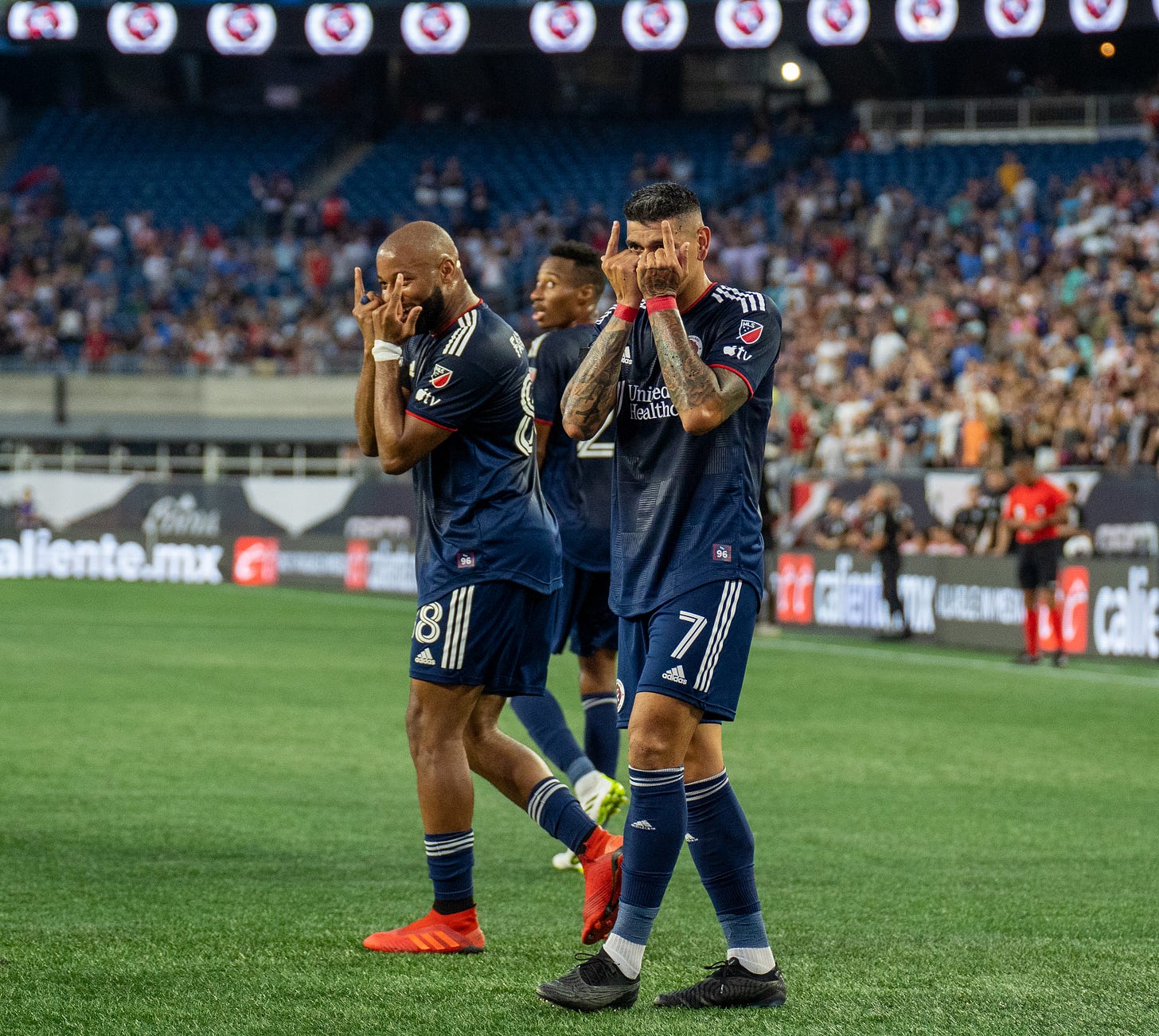 Gustavo Bou and Andrew Farrell celebrate after a goal