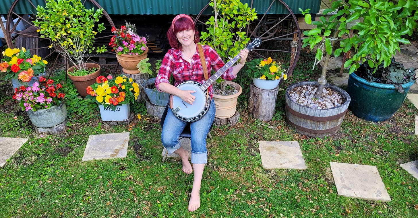 Pickin' the banjer on the riverbank