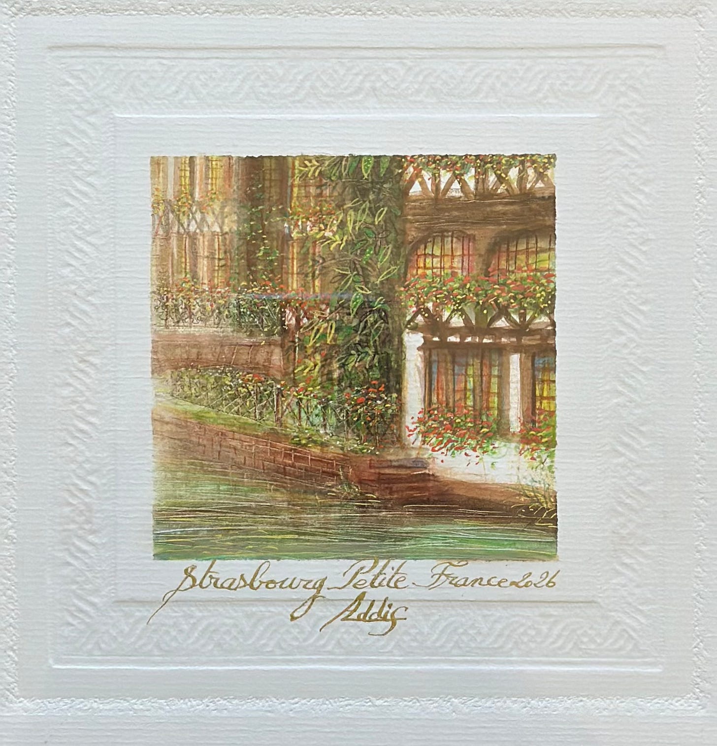 watercolor of a river and old French building with vines and greenery of Petite France in Strasbourg