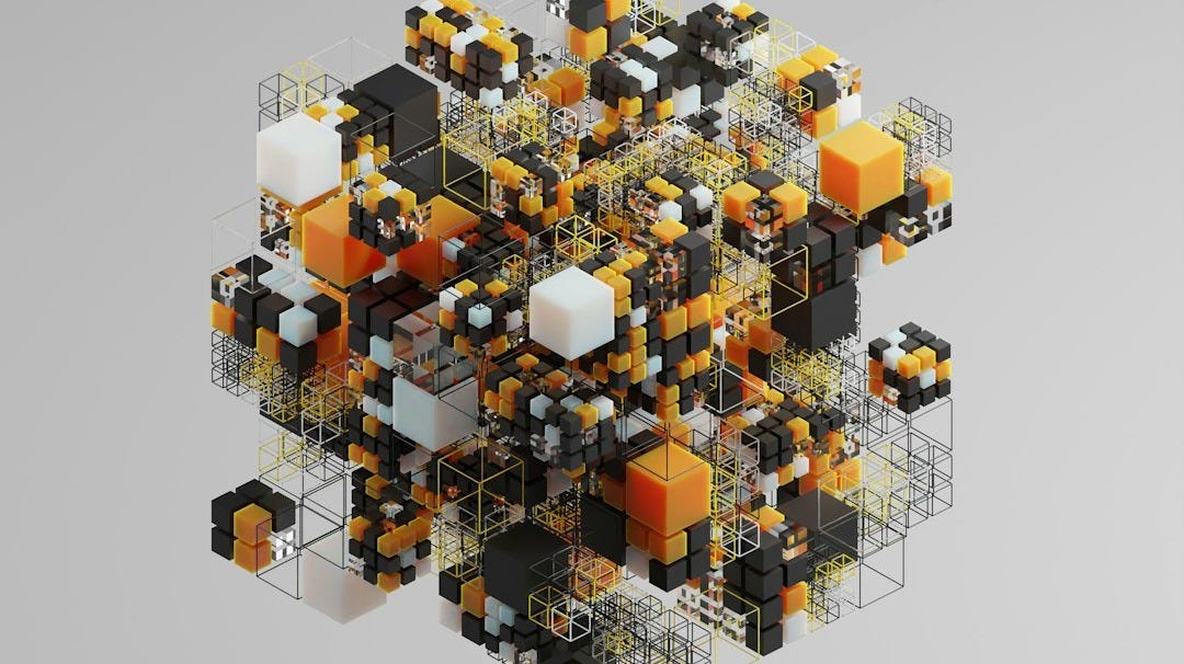 a computer generated image of a cluster of cubes a computer generated image of a cluster of cubes