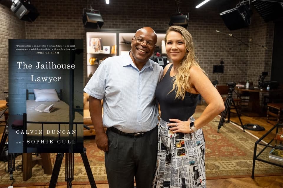 May be an image of 2 people and text