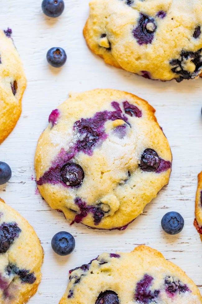 Blueberry Muffin Tops - If you like to eat just the tops of your muffins, you're going to LOVE this EASY recipe for soft and tender blueberry muffin tops bursting with juicy berries in every bite!! Only 1/2 cup sugar in the entire batch!! Blueberry Muffin Tops - If you like to eat just the tops of your muffins, you're going to LOVE this EASY recipe for soft and tender blueberry muffin tops bursting with juicy berries in every bite!! Only 1/2 cup sugar in the entire batch!!