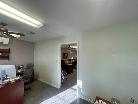 Six photos of the green walls in the office before we got to work painting..