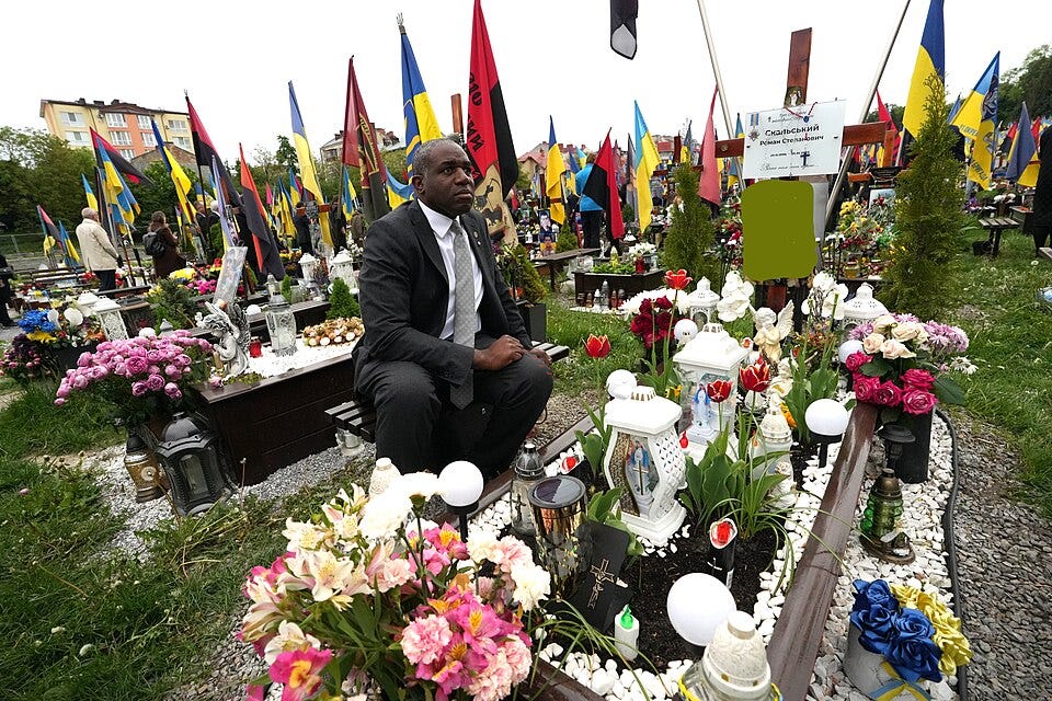 File:Foreign Secretary David Lammy lays a candle on the grave of a Ukrainian soldier killed in the conflict with Russia, in the Lychakiv Cemetery in Lviv, Ukraine on 9 May 2025.jpg