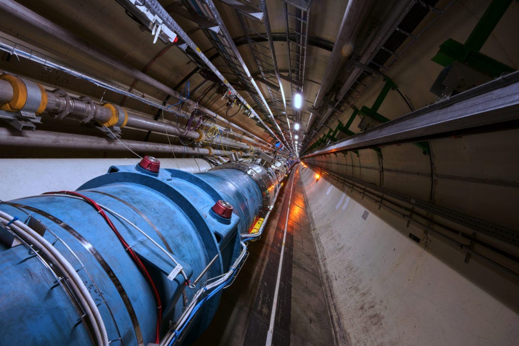 A section of the 27 kilometer (16.6 mile) long circular track of Large Hadron Collider at CERN. Within the blue pipe, particles move at close to the speed of light. Image Credit: CERN A section of the 27 kilometer (16.6 mile) long circular track of Large Hadron Collider at CERN. Within the blue pipe, particles move at close to the speed of light. Image Credit: CERN