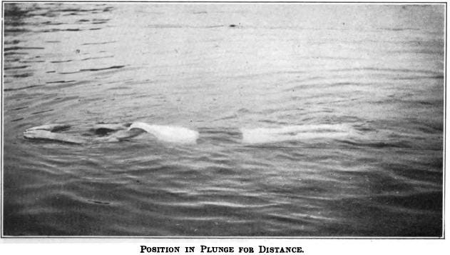 A grainy black and white image of a man floating in water with his arms in front of him.