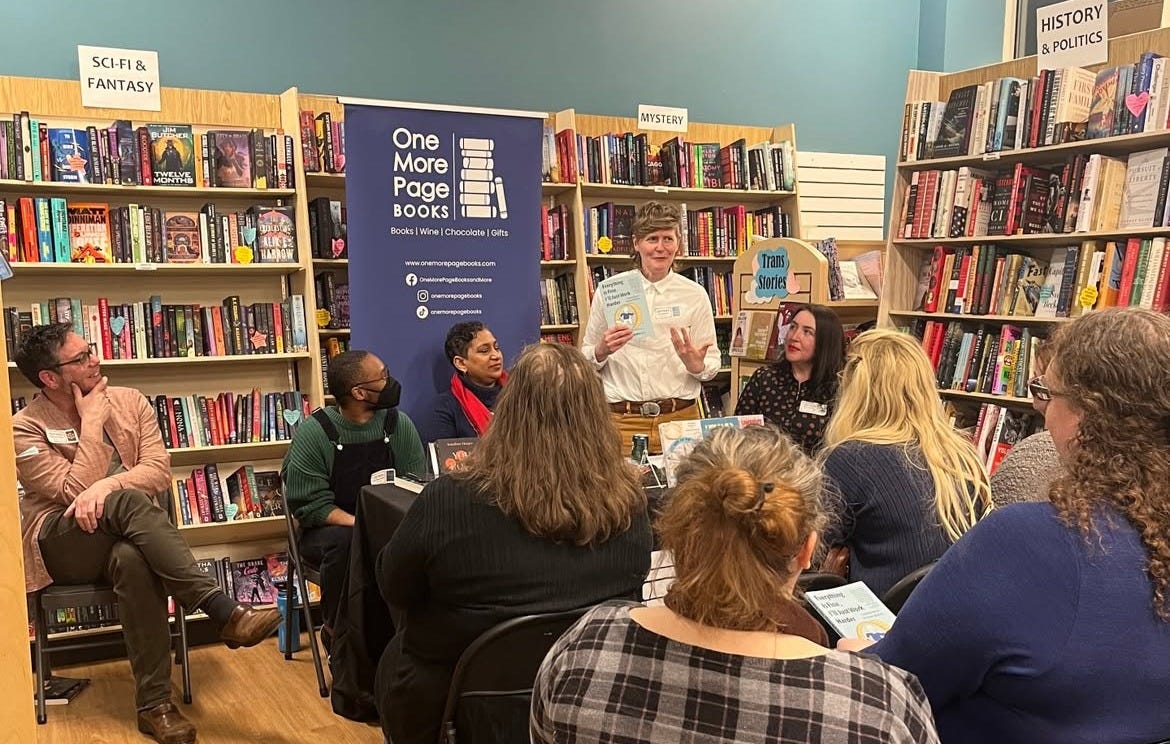 The author speaking in front of an audience