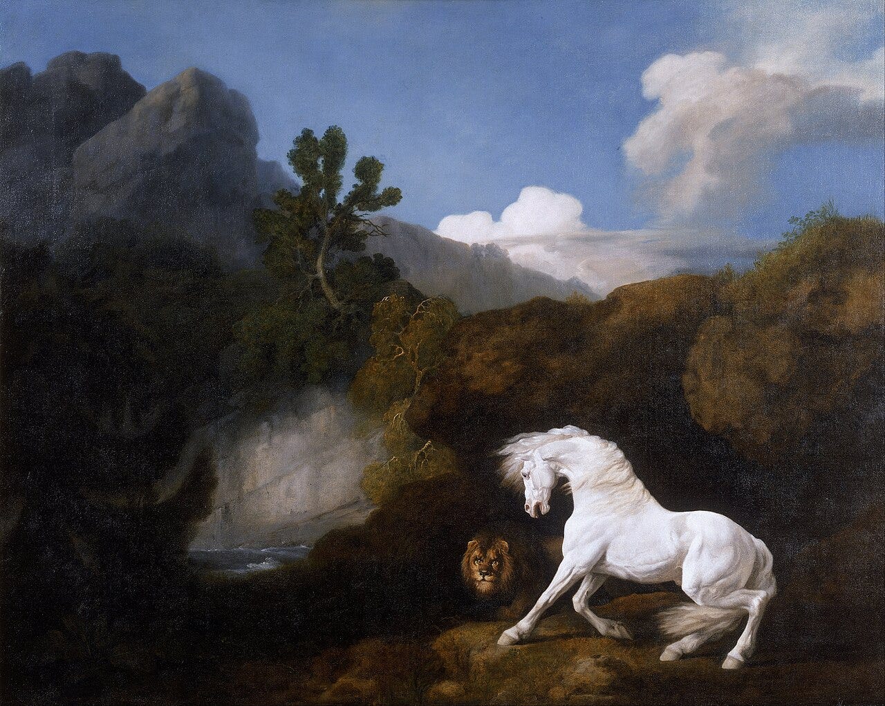 A white horse rears in terror as a lion crouches to attack in a dark rocky landscape A white horse rears in terror as a lion crouches to attack in a dark rocky landscape