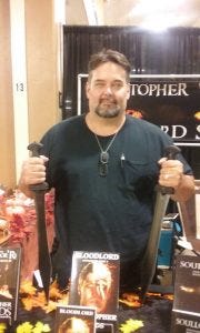 Christopher Woods at his booth Christopher Woods at his booth