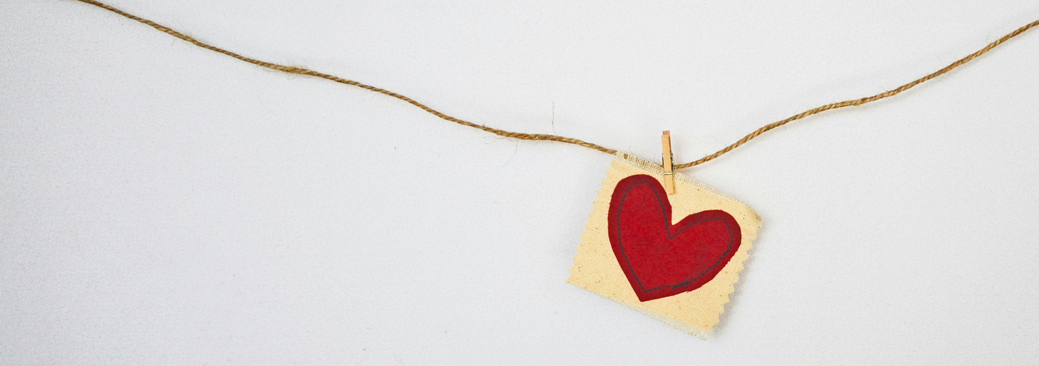 a heart on a string representing human connection a heart on a string representing human connection