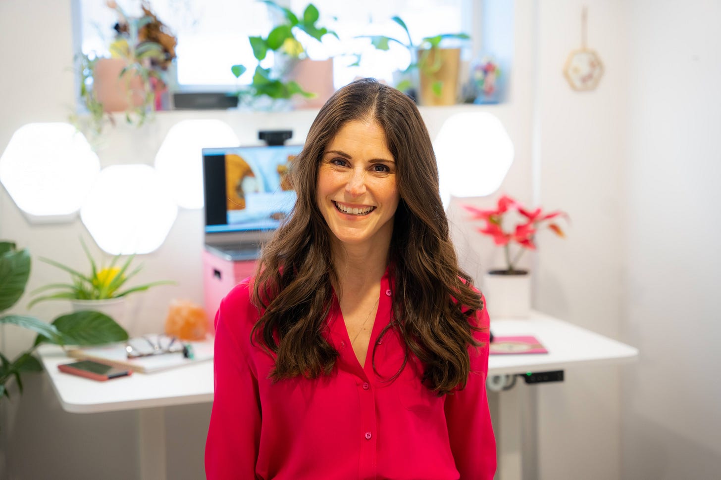 Jesse Lane Lee in a bright pink long sleeve top Jesse Lane Lee in a bright pink long sleeve top