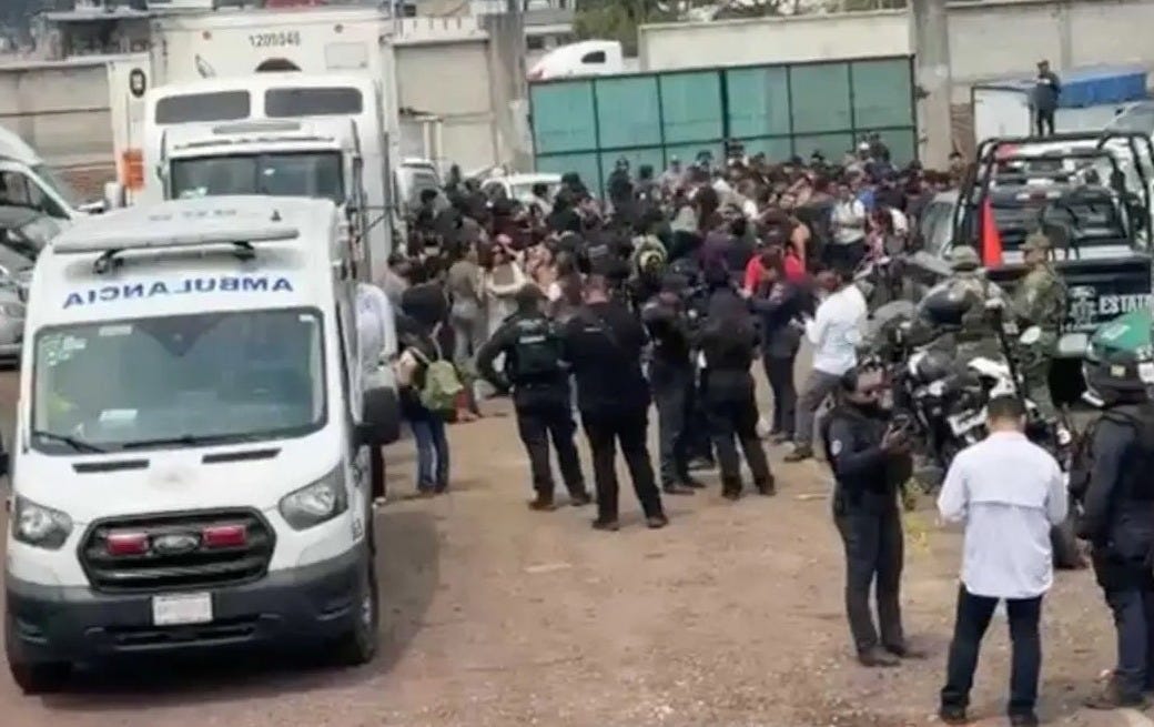 Medical personnel and police in Xelapa, Veracruz, aid a large group of migrants found locked in a stolen semi-truck. The group was en route to the US. Medical personnel and police in Xelapa, Veracruz, aid a large group of migrants found locked in a stolen semi-truck. The group was en route to the US.