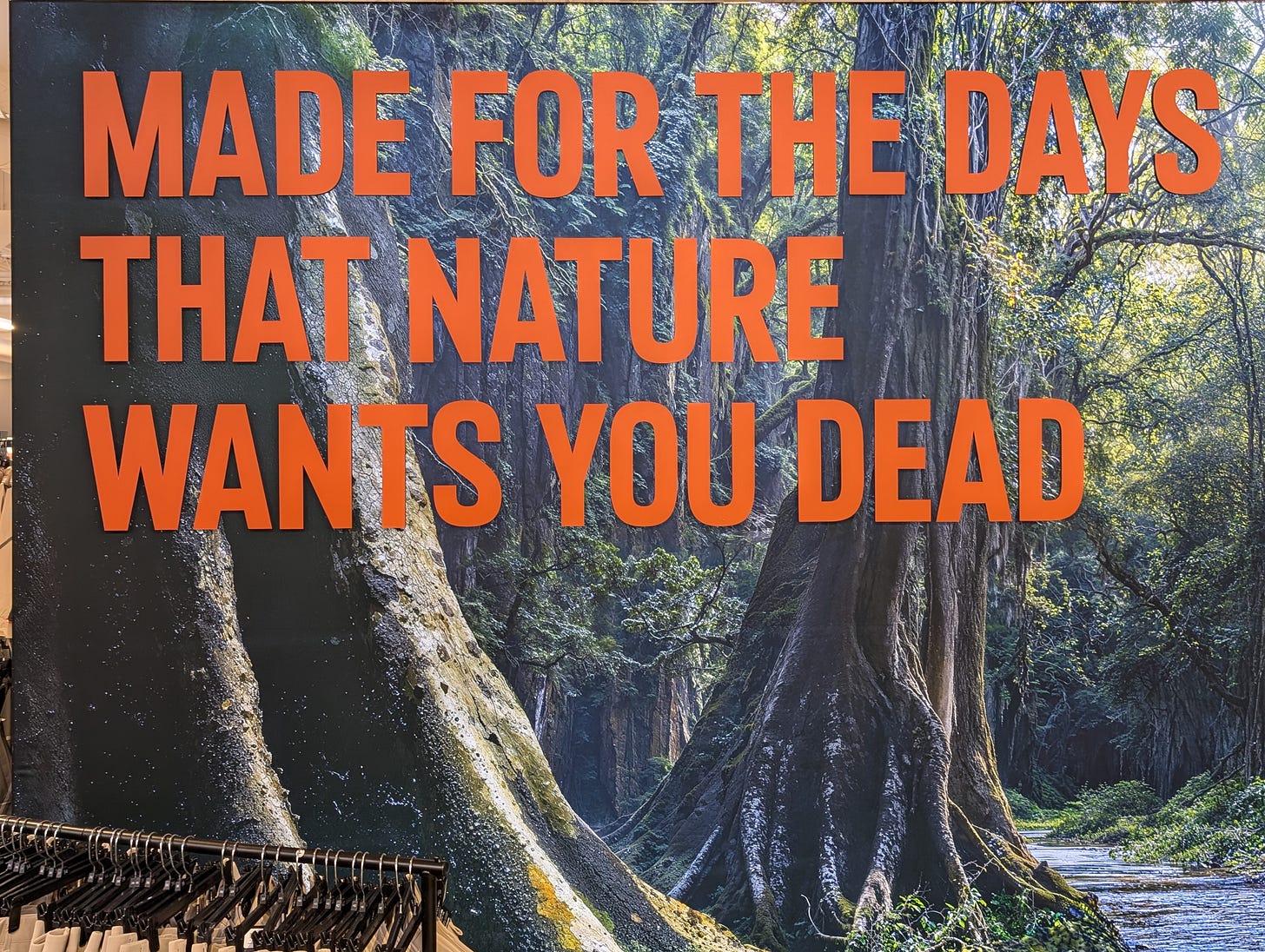 Mural reading "Made for the days that nature wants you dead"