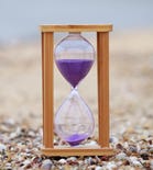 A sand timer on a shingle beach,