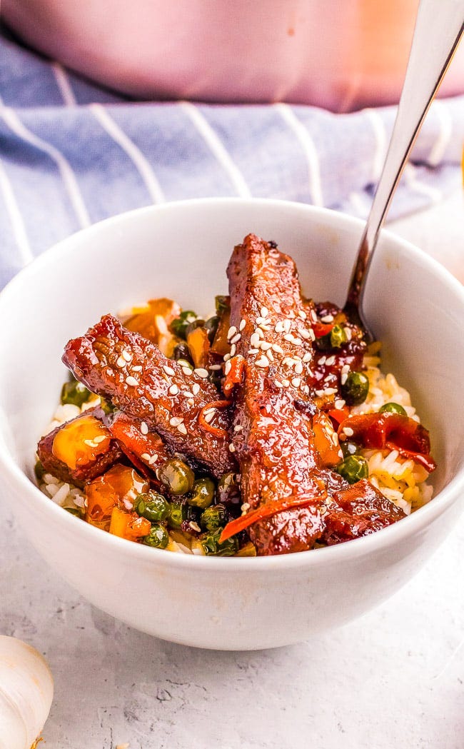 Mongolian Beef Stir-Fry Bowls — These EASY Chinese-inspired Mongolian beef stir-fry bowls are ready in just 10 minutes!! Loaded with rich savory flavor, crisp-tender vegetables, and served over rice! Faster than calling for takeout when you're craving Asian food!! Mongolian Beef Stir-Fry Bowls — These EASY Chinese-inspired Mongolian beef stir-fry bowls are ready in just 10 minutes!! Loaded with rich savory flavor, crisp-tender vegetables, and served over rice! Faster than calling for takeout when you're craving Asian food!!