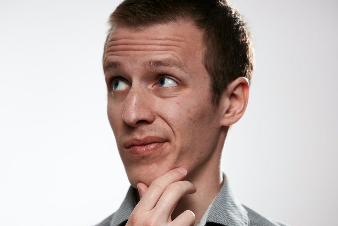 man in gray button up shirt