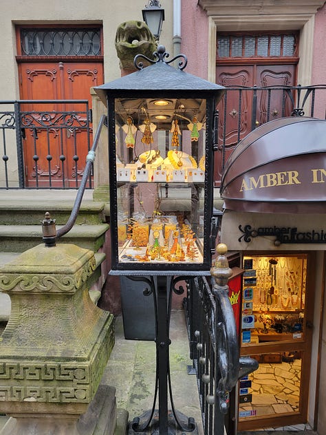 Five photographs of the historic main city in Gdansk, Poland.