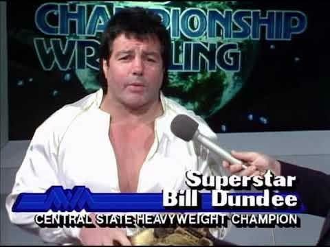 May be an image of text that says 'HA AR IONSHI LING Superstar Bill Dund ee CENTRAL STATEHEAVYWEIGH WEIGHT CHAMPION' May be an image of text that says 'HA AR IONSHI LING Superstar Bill Dund ee CENTRAL STATEHEAVYWEIGH WEIGHT CHAMPION'