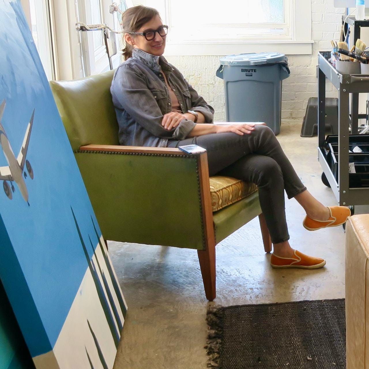 A person sitting in a chair

Description automatically generated