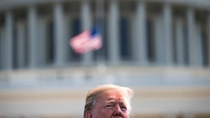 A cropped image of Donald Trump outside of the Capitol Building on Capitol Hill in Washington, DC in 2019. (Photo via Getty Images)