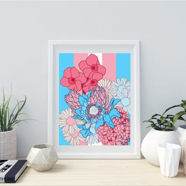 Beautiful framed print of a trans flag with flowers in the trans colors, pink, blue, and white Beautiful framed print of a trans flag with flowers in the trans colors, pink, blue, and white