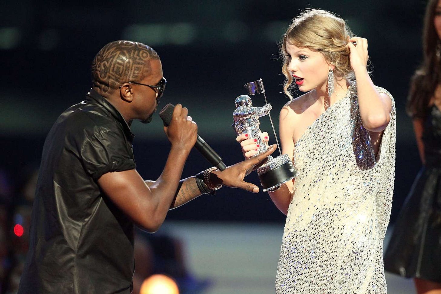 Revisiting Taylor Swift and Kanye West's Infamous VMAs Moment, 15 Years Later Revisiting Taylor Swift and Kanye West's Infamous VMAs Moment, 15 Years Later