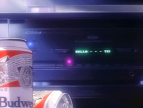 This may contain: a can of budweiser beer sitting on top of a table next to a radio This may contain: a can of budweiser beer sitting on top of a table next to a radio