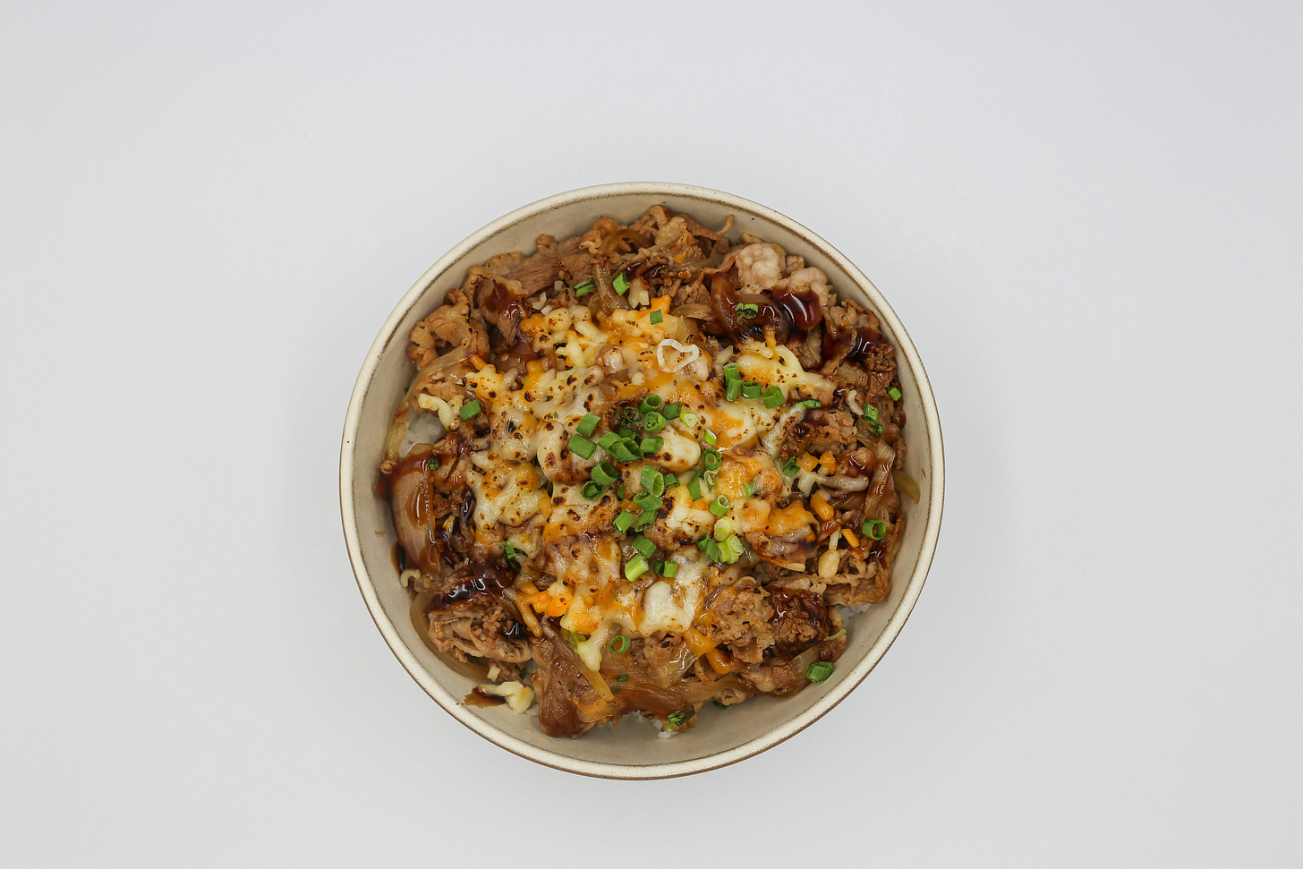 Global comfort food bowl 2025 trending recipe with rice meat and scallions