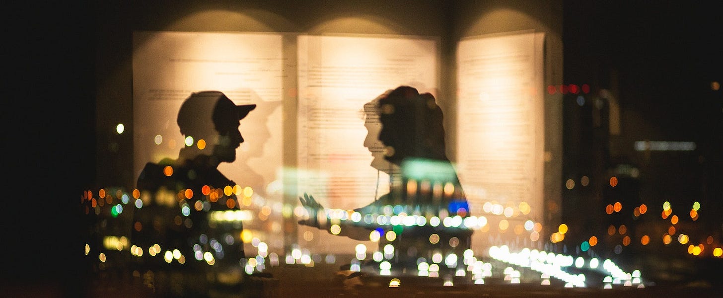 Two people in a conversation Two people in a conversation