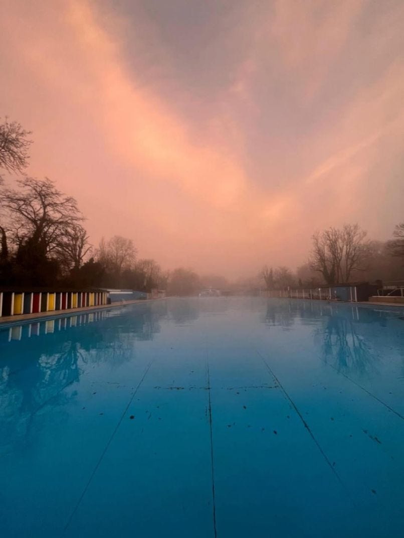 May be an image of swimming, fog, pool, twilight and horizon