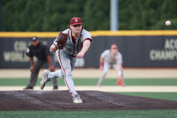 Jamie Arnold of the Florida State Seminoles pitches against the Wake Forest Demon Deacons at David F. Couch Ballpark on April 19, 2024 in Winston...