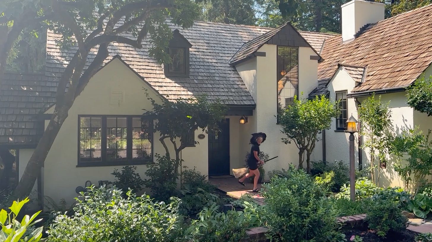 exterior, tudor, charm, interior design, architecture, architectural digest, Lake Oswego, garden, outdoor oasis, witch, witch on broom, halloween, halloween humor, broomstick, riding on broom