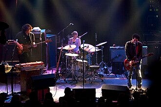 Yo La Tengo performing in 2010. From left to right: McNew, Hubley, and Kaplan